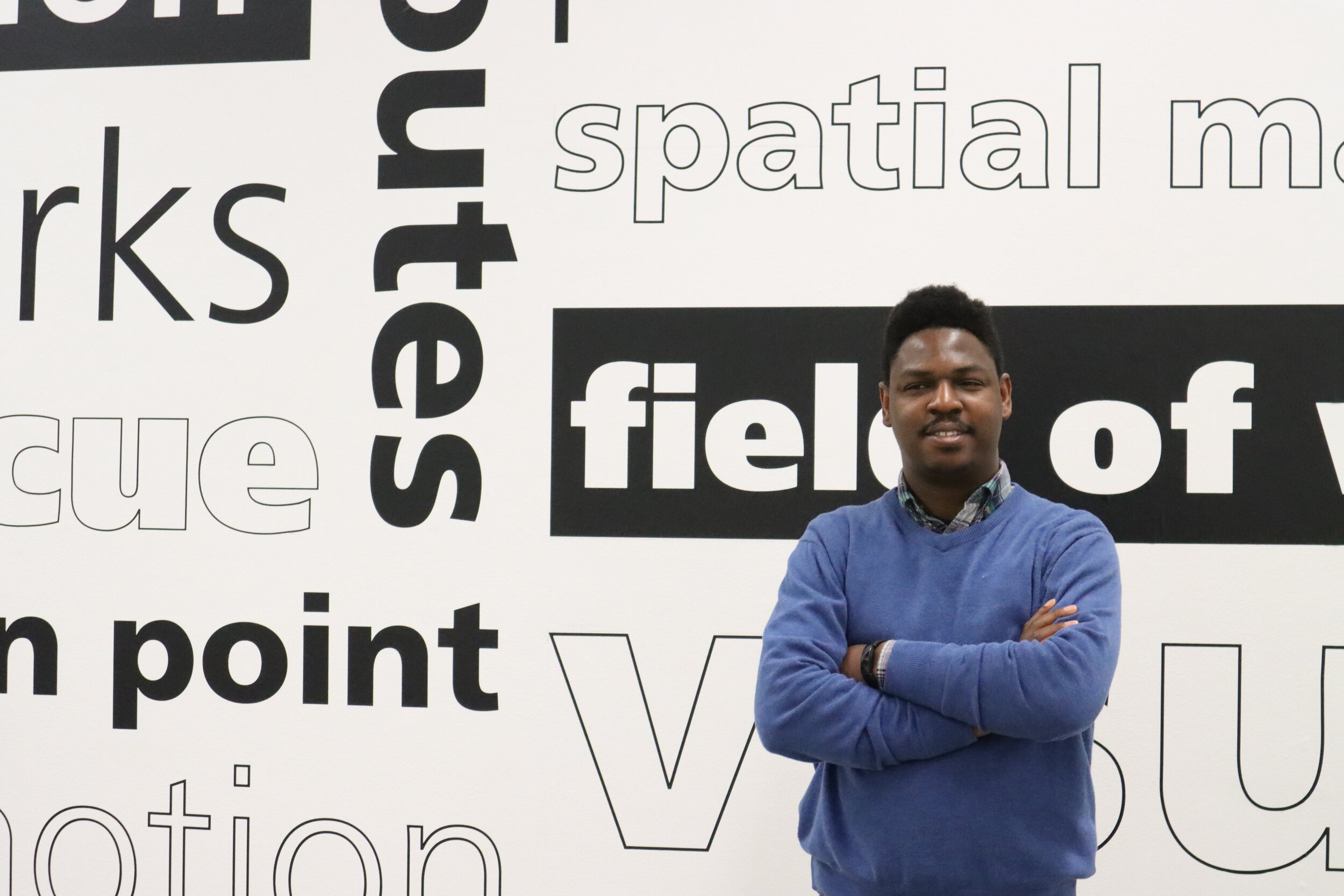 Close view of directional signage panels with braille