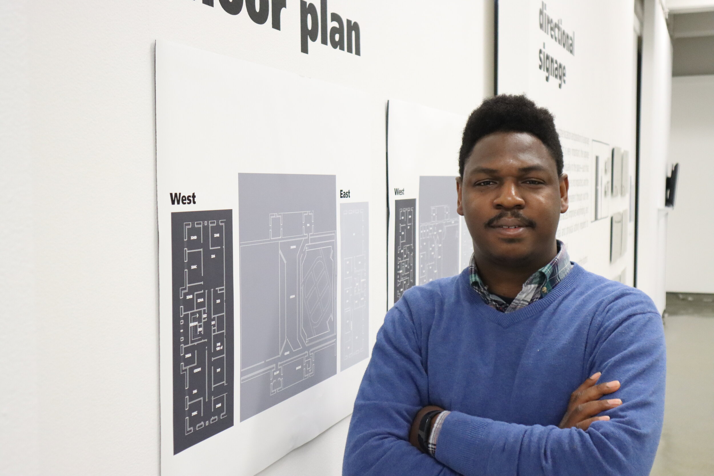 Identification signage — room 201 panel with braille